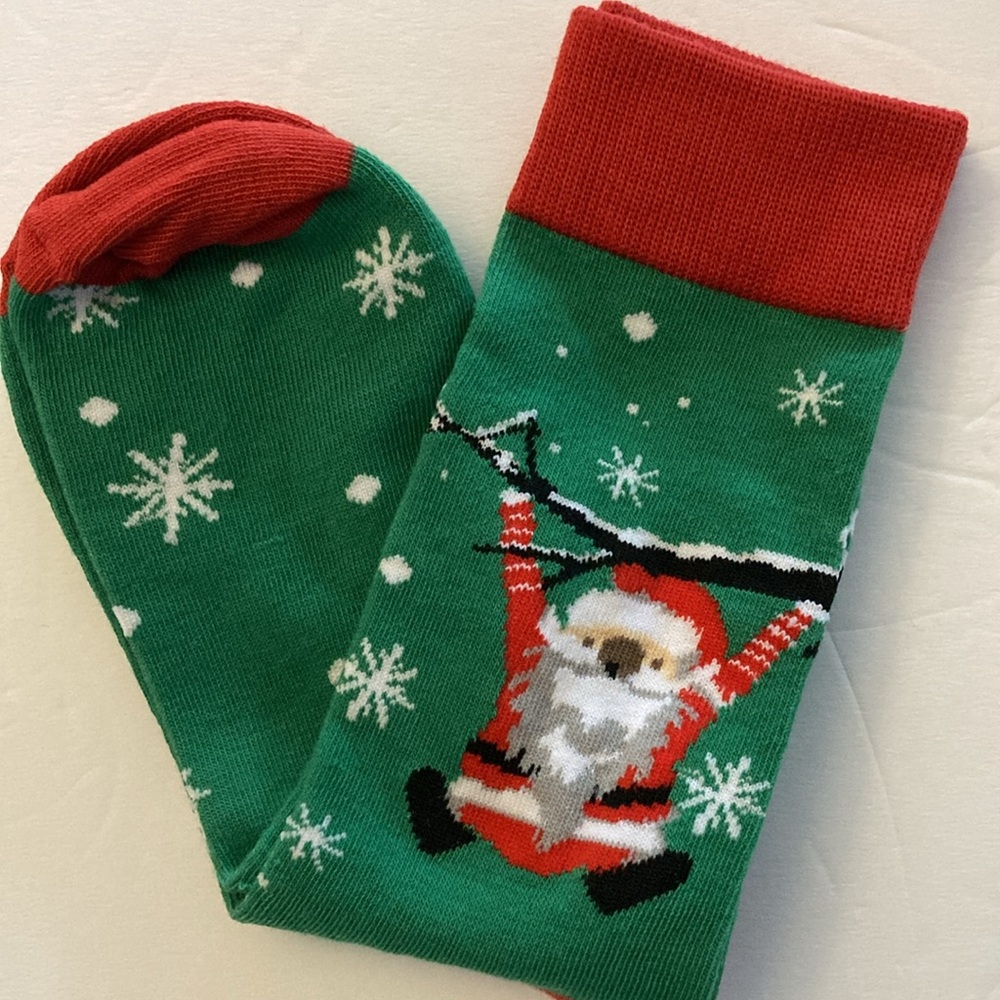 Santa Claus Christmas socks Santa on a tree branch